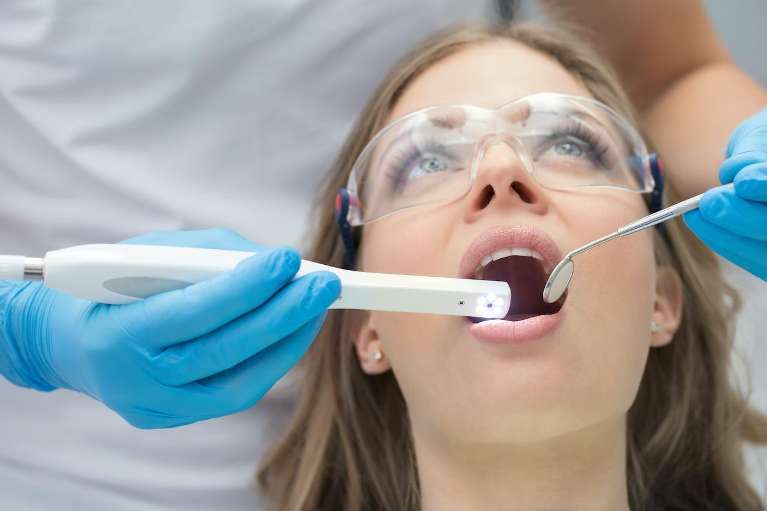 Woman getting dental work done, centerville ohio