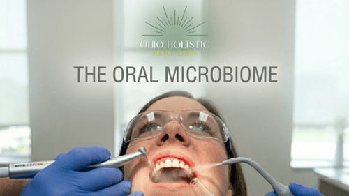 Woman receiving dental cleaning at Ohio Holistic Dental Center illustrating oral microbiome care