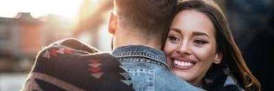 Woman embracing a man smiling with white teeth, centerville oh