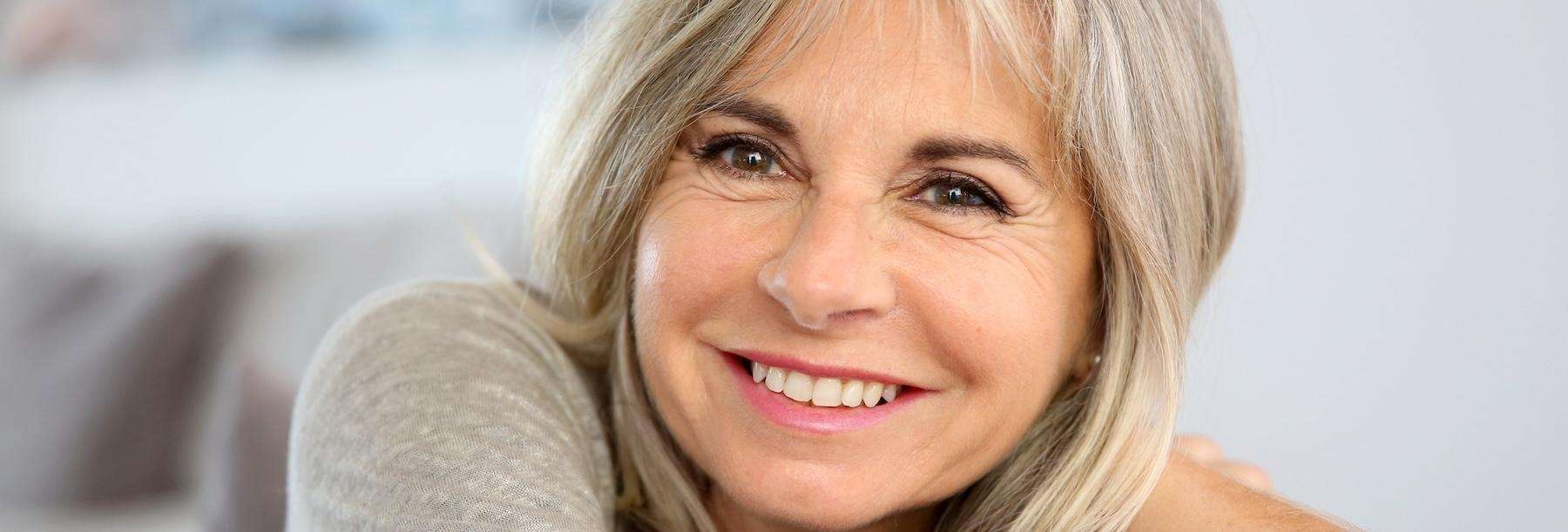 Older woman smiling after bruxism treatment, centerville oh